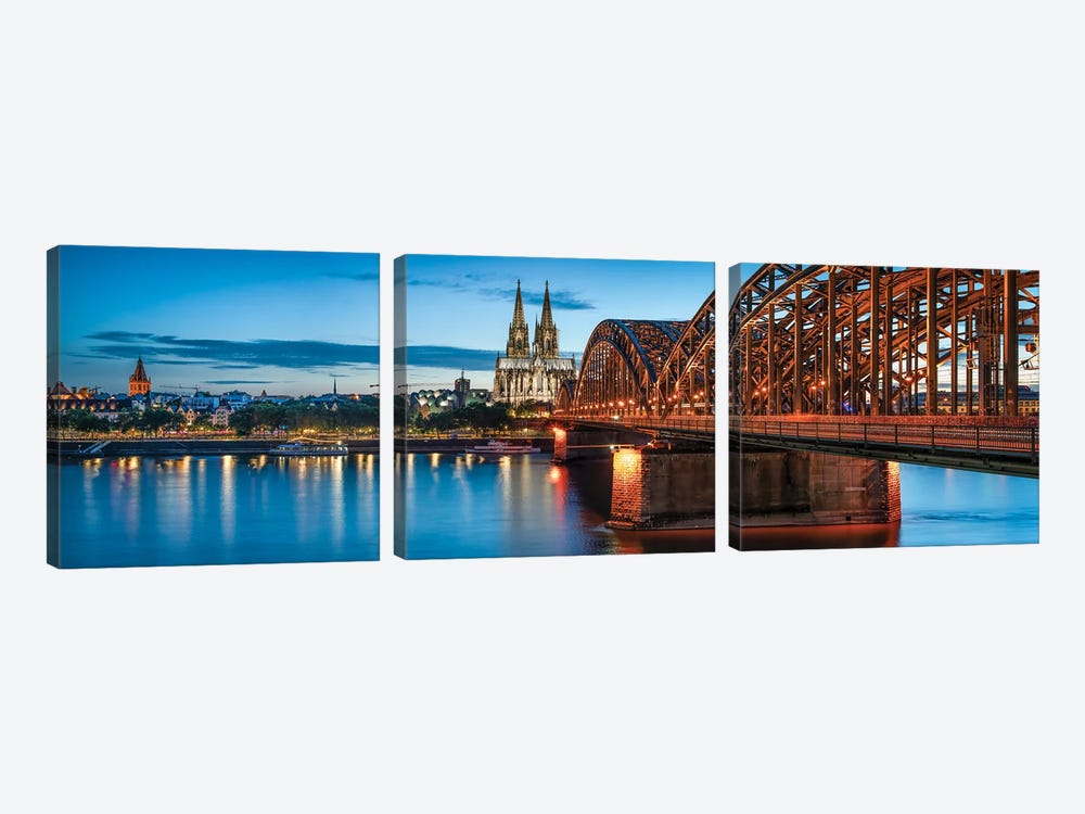 Panoramic View Of The Cologne Skyline With Cologne Cathedral And Hohenzollernbrücke At Night by Jan Becke 3-piece Canvas Art