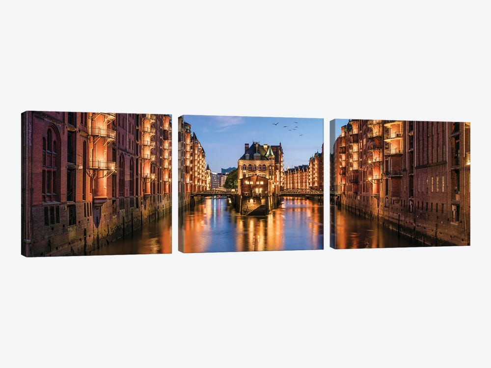 Panoramic View Of The Wasserschloss (Water Castle) In The Historic Speicherstadt District In Hamburg, Germany by Jan Becke 3-piece Art Print