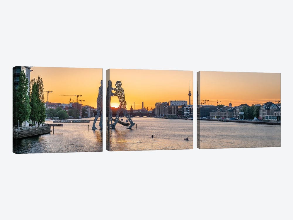 Panoramic View Of The Spree River At Sunset With Molecule Man Sculpture And Berlin Television Tower (Fernsehturm Berlin) by Jan Becke 3-piece Canvas Art Print