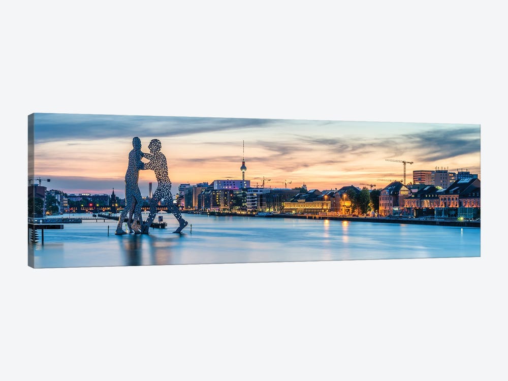 Berlin Skyline With Molecule Man Sculpture Along The Spree River At Sunset by Jan Becke 1-piece Canvas Art Print