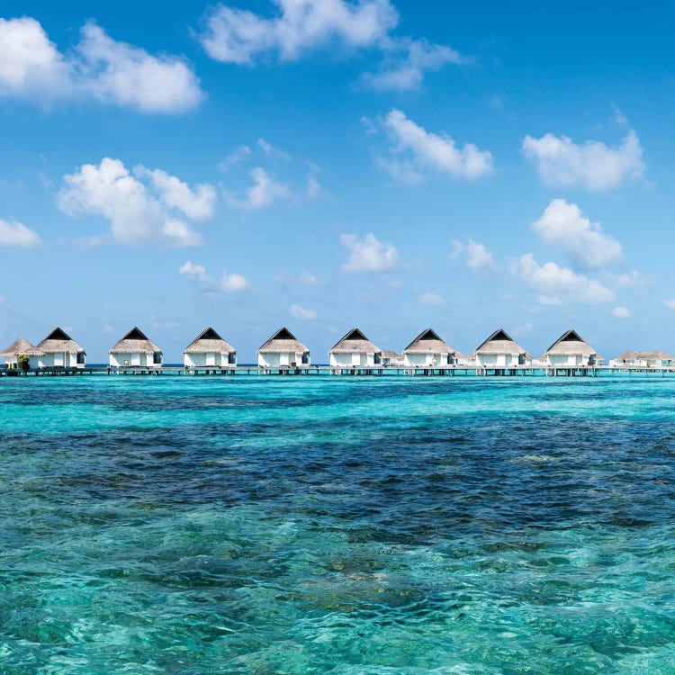 Overwater Villas At A Luxury Beach Resort In The Maldives