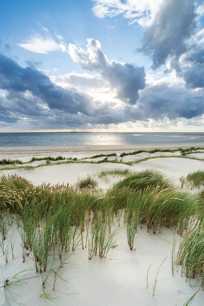 Beach Sunrises & Sunsets: Storm Clouds At The Dune Beach by Jan Becke