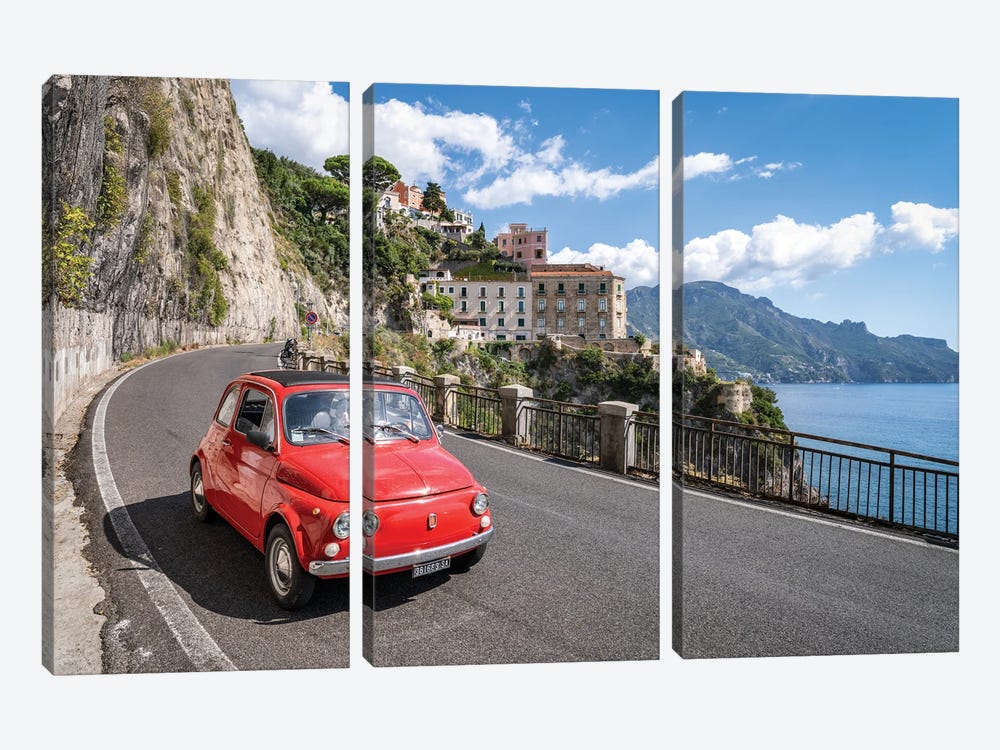 Red Fiat Cinquecento Fiat 500 Along The Amalfi Coast With The Town Of Atrani In The Background Naples, Italy by Jan Becke 3-piece Canvas Art Print