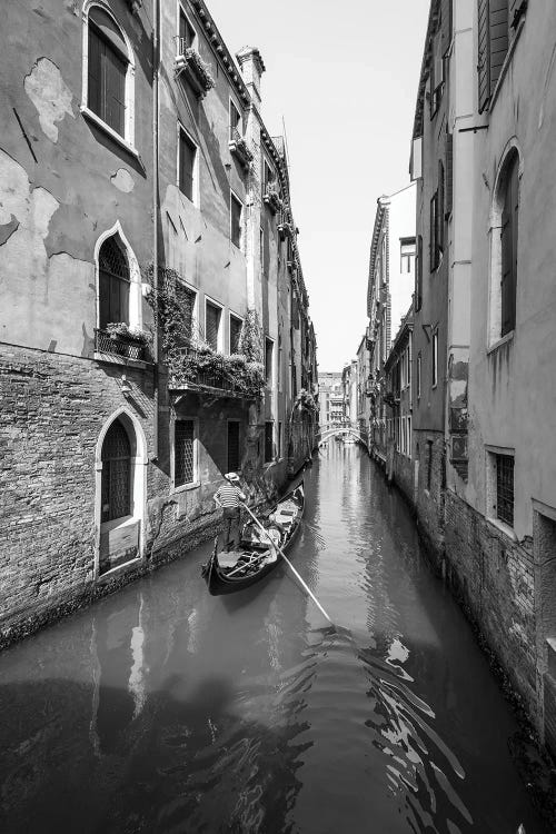 Gondola Ride On A Canal In Venice, Italy