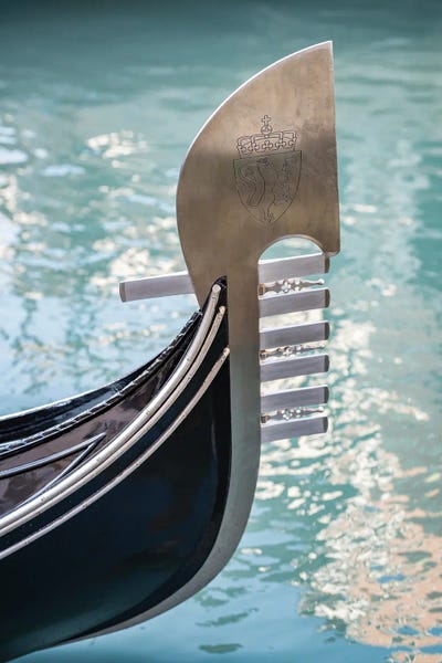 Venice: Bow Fitting Ferro Di Prua On A Venetian Gondola In Venice, Italy by Jan Becke