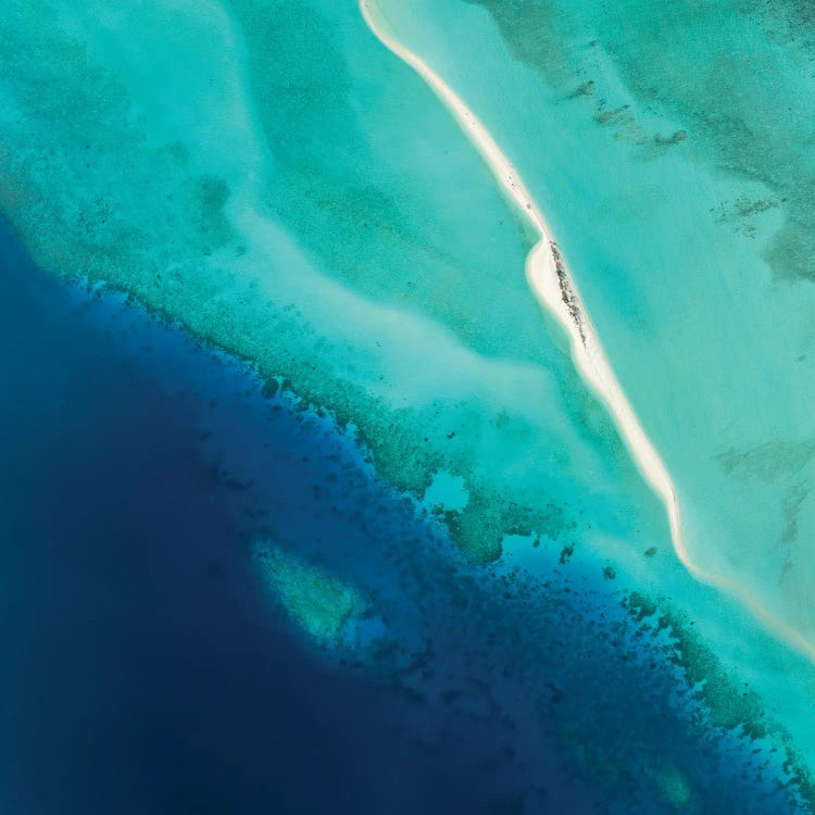 Aerial View Of A Sandbank And Blue Lagoon In Maldives by Jan Becke wall art