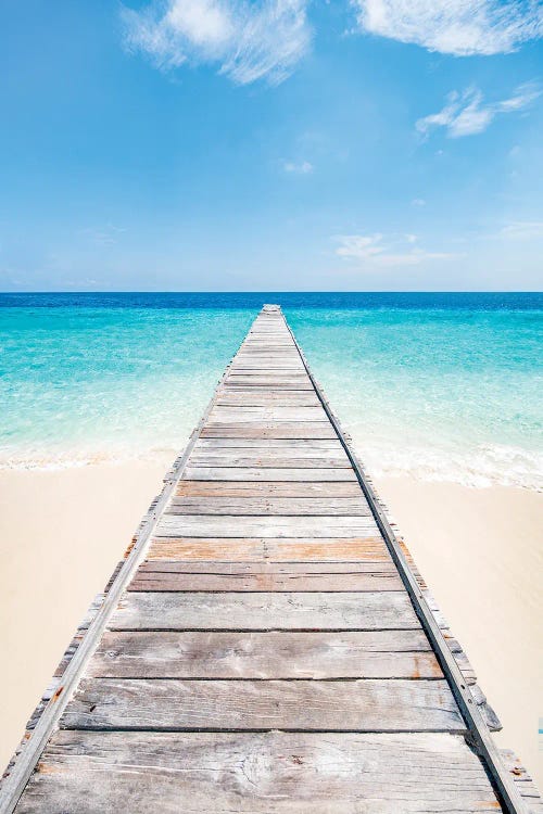 Wooden Pier At The Beach In The Maldives