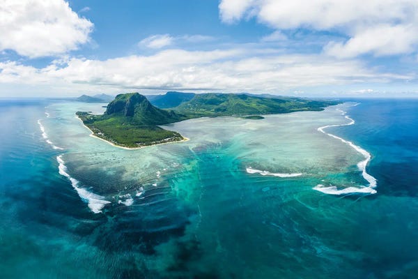 Islands: Aerial View Of The Lagoon With Underwater Waterfall Illusion On Mauritius Island by Jan Becke