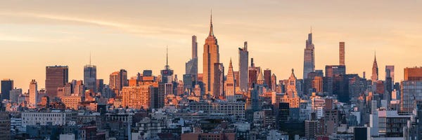 Manhattan: Manhattan Skyline Panorama At Sunset, New York City by Jan Becke