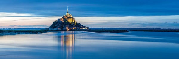 Normandy: Panoramic View Of Mont-Saint-Michel Tidal Island At Dusk, Normandy, France by Jan Becke