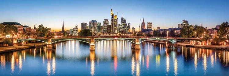 Frankfurt central business district and Ignatz-Bubis-Brücke (Ignatz Bubis Bridge) at night, Hesse, Germany