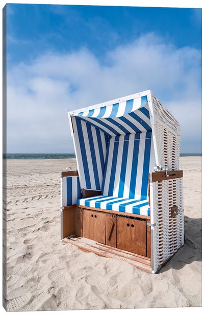 Roofed wicker beach chair at the North Sea coast Canvas Art Print - Furniture