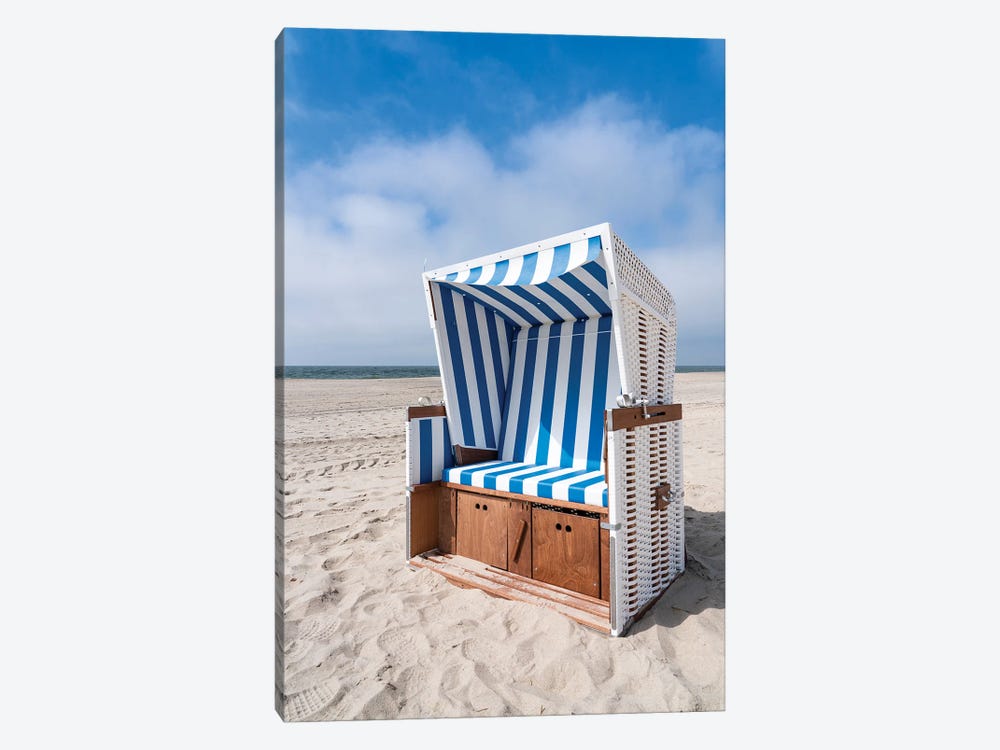Roofed wicker beach chair at the North Sea coast by Jan Becke 1-piece Canvas Art