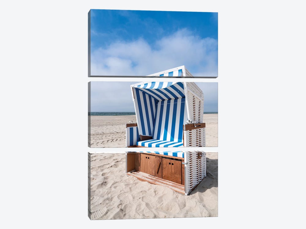 Roofed wicker beach chair at the North Sea coast by Jan Becke 3-piece Canvas Wall Art