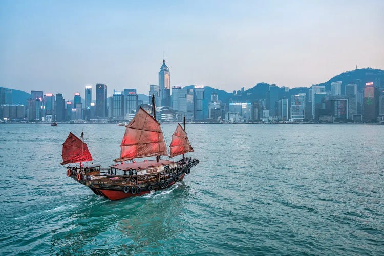 Junk boat with red sail at Victoria Harbour, Hongkong, China