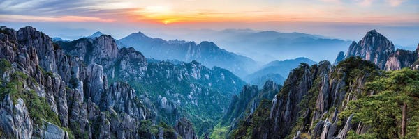Mountain Sunrises & Sunsets: Panoramic view of the Huangshan landscape at sunrise by Jan Becke
