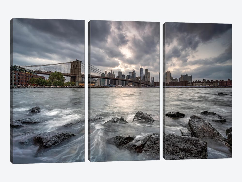 Brooklyn Bridge and Manhattan Skyline on a cloudy day by Jan Becke 3-piece Canvas Art Print