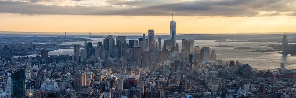 Aerial Photography: Lower Manhattan skyline panorama at sunset, New York City, USA by Jan Becke