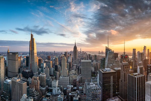 Places: Dramatic sunset over the Manhattan skyline, New York City, USA by Jan Becke