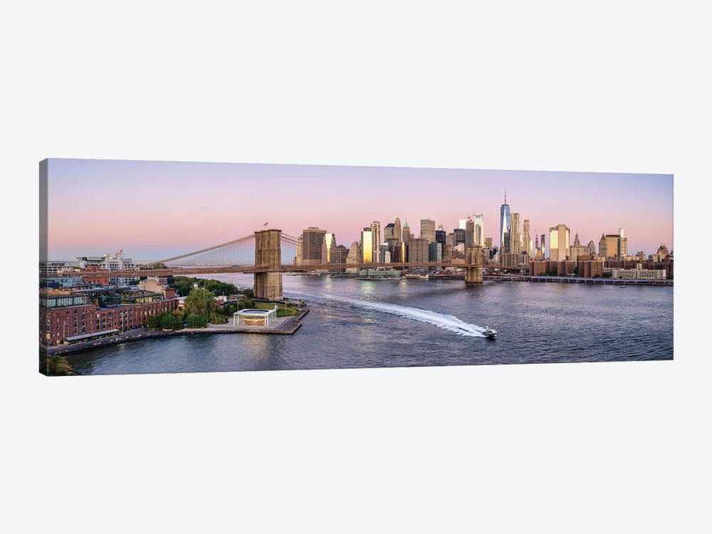 Manhattan skyline panorama with Brooklyn Bridge and East River at sunrise by Jan Becke 1-piece Art Print