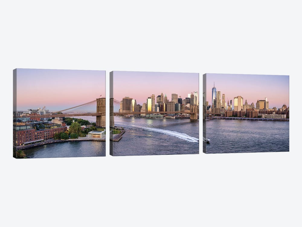 Manhattan skyline panorama with Brooklyn Bridge and East River at sunrise by Jan Becke 3-piece Art Print