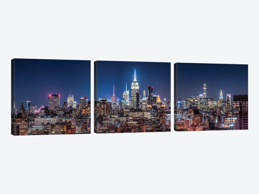 Panoramic View Of The Midtown Manhattan Skyline With Empire State Building At Night by Jan Becke 3-piece Canvas Print