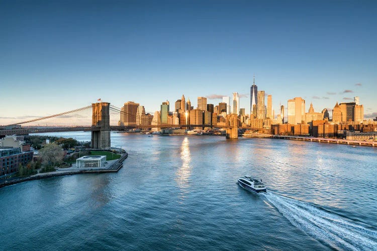 Manhattan Skyline And Brooklyn Bridge At Sunrise by Jan Becke wall art