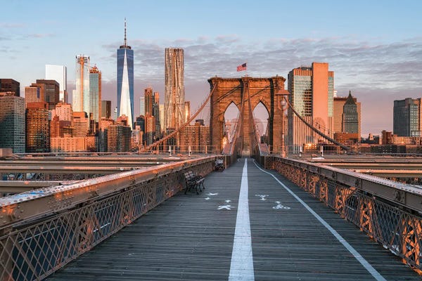 Brooklyn: Brooklyn Bridge And Lower Manhattan Skyline At Sunrise, New York City, Usa by Jan Becke