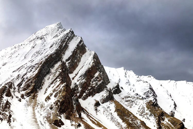 Snow Covered Mountains And Stormy Sky, Svalbard