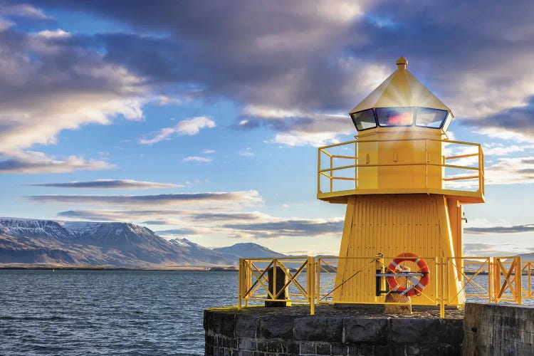 Lighthouse In Reykjavik Harbour At Daybreak