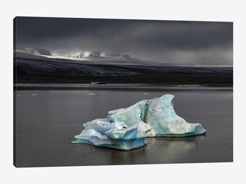 Iceberg Against Stormy Skies And Sunlight by Jane Rix 1-piece Canvas Wall Art