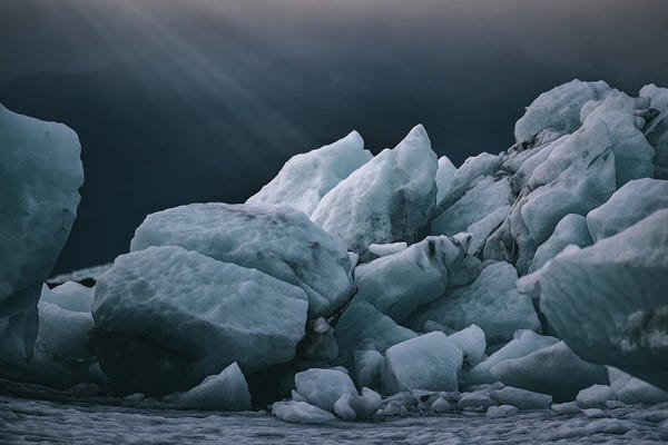 Glaciers & Icebergs: Sun Rays Highlight Blue Ice by Jane Rix