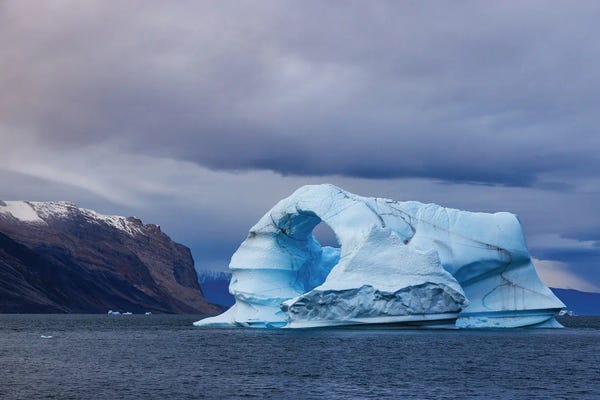 Glaciers & Icebergs: Blue Iceberg With Arch, Greenland by Jane Rix