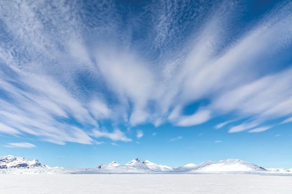 Svalbard Snowy Mountains And Sky