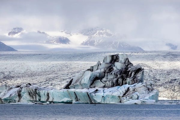 Blue Iceberg With Volcanic Ash