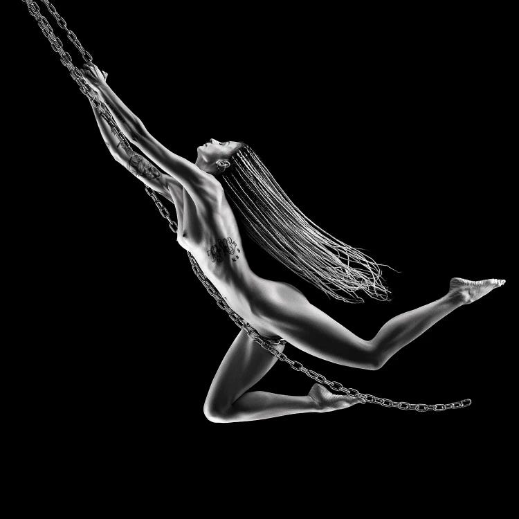 Nude Woman Swinging On Chains