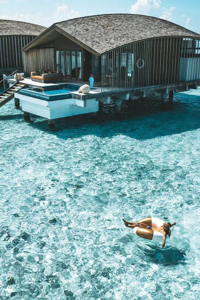 Maldives: Maldives Resort Bungalows Girl Pool Ring (Tall) by James Vodicka