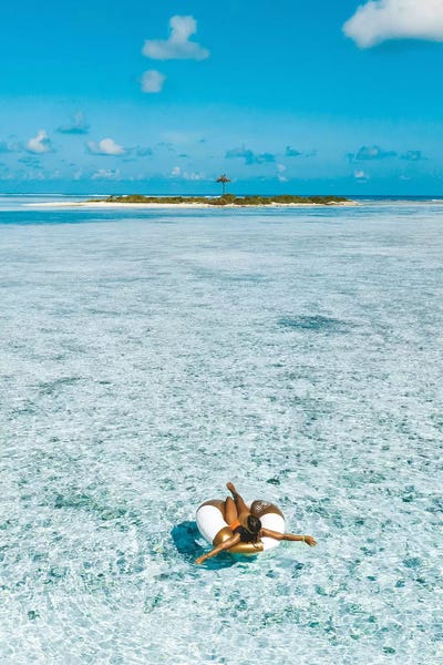 Maldives Resort Island Girl Pool Ring by James Vodicka framed wall art