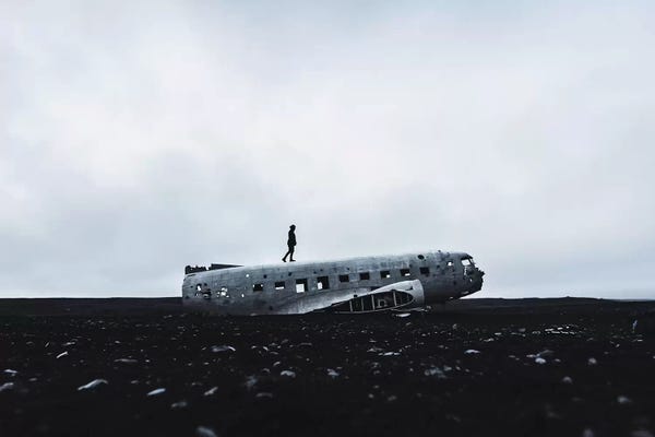 James Vodicka: Man Walking Plane Wreck by James Vodicka