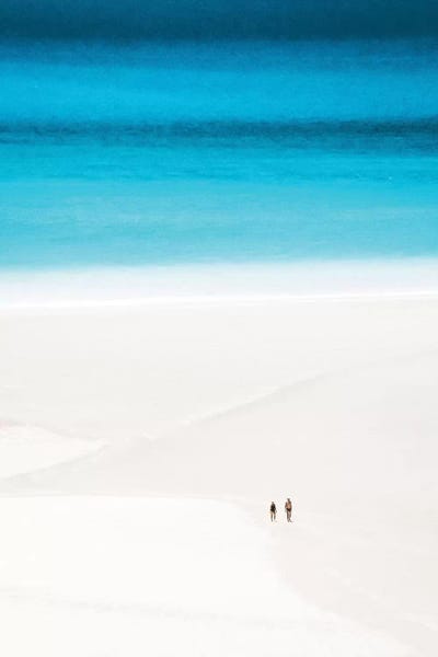 Couple Walk Secluded White Sand Beach