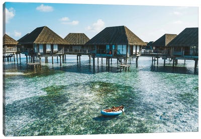 Maldives Resort Bungalows Girl Pool Float Canvas Art Print - Maldives