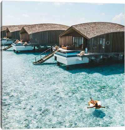 Maldives Resort Bungalows Girl Pool Ring Canvas Art Print - Maldives