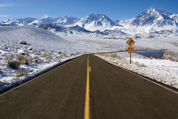 Usa, California. Road Into Sierra Nevada Mountains In Winter.