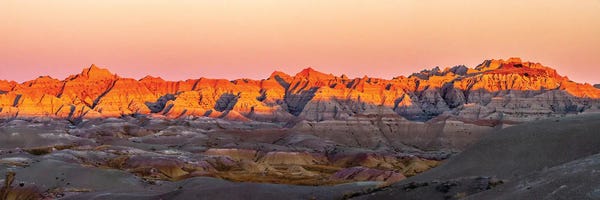 Badlands National Park: USA, South Dakota, Badlands National Park. Panoramic Of Sunrise On Arid Park Formations. by Jaynes Gallery