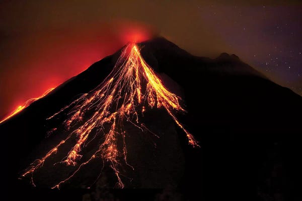 Volcanoes: Caribbean, Costa Rica. Mt. Arenal erupting with molten lava  by Jaynes Gallery