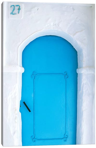 Africa, Morocco, Chefchaouen. Blue door in white building.  Canvas Art Print - Moroccan Culture
