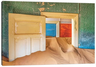 Africa, Namibia, Kolmanskop. Doorways and drifting sand in an abandoned diamond mining town. Canvas Art Print - Jaynes Gallery