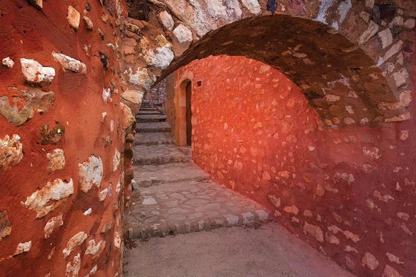 France, Provence, Roussillon. Stone arch and passageway.