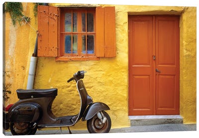 Greece, Rhodes. Vespa motorbike and colorful house exterior.  Canvas Art Print - Door Art
