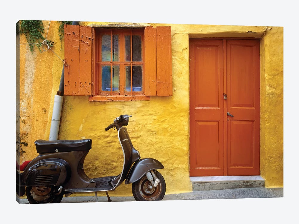 Greece, Rhodes. Vespa motorbike and colorful house exterior.  by Jaynes Gallery 1-piece Canvas Wall Art